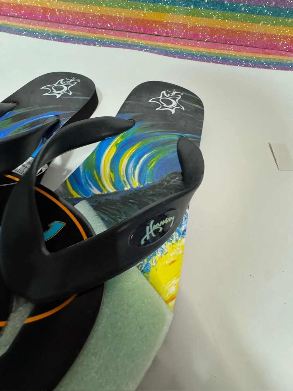 limited edition Havassy Verde WearableArt flip-flops featuring olive green strap